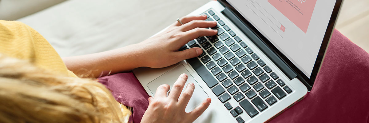Image of employee on laptop